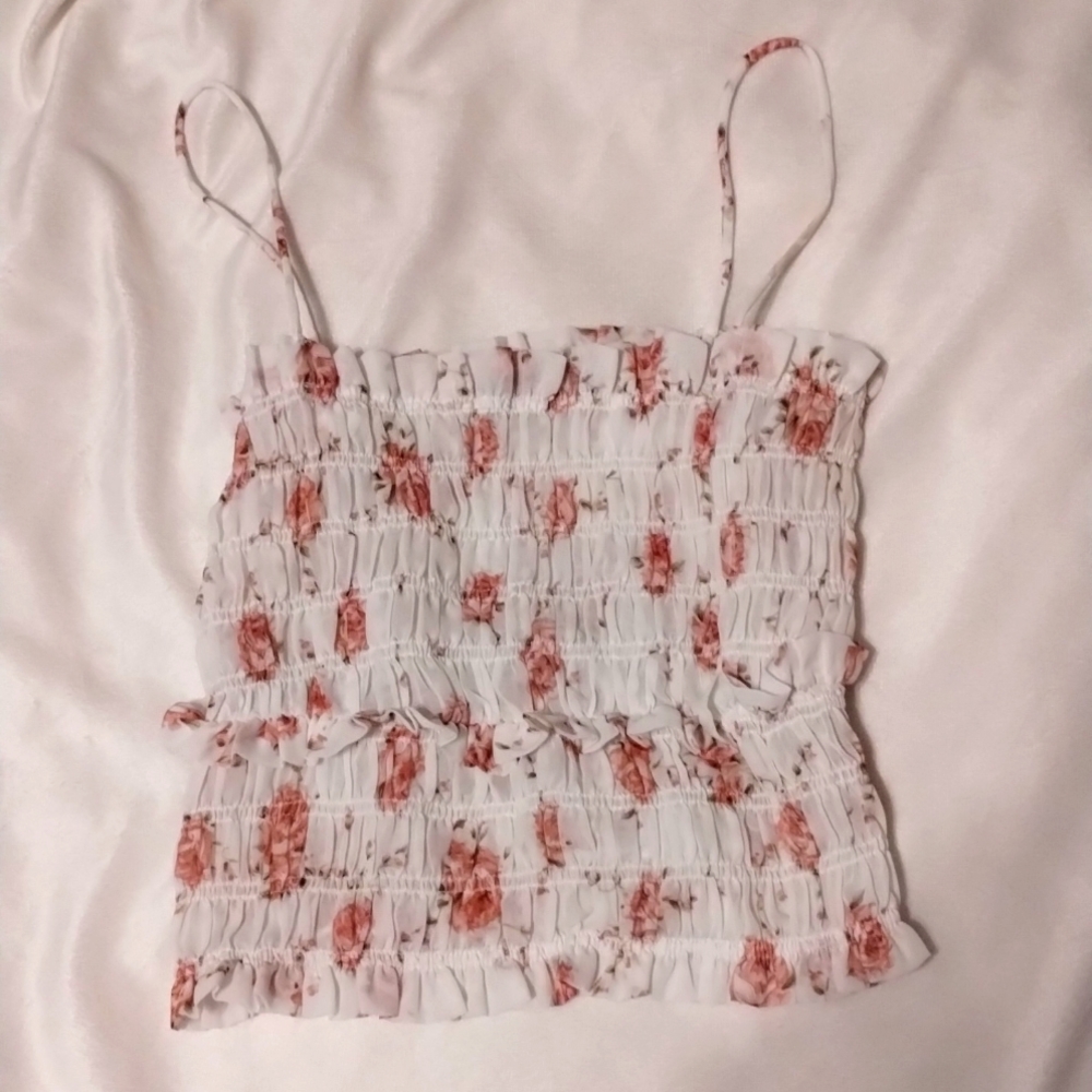 white ruffled top with roses